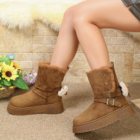 Camel round-toe platform boots with faux-fur trim and two buckle straps