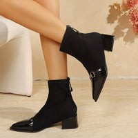 Black sock boots with pointed toe and side buckle hardware