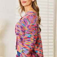 Multicolor knit cardigan with v-neckline, button placket, and long sleeves