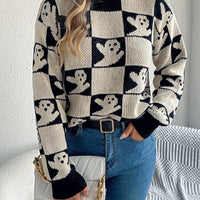 Ghost checkerboard knit sweater, black and cream pattern with ribbed crew neck