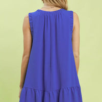 Sapphire blue sleeveless mini dress, ruched back yoke and tiered hem