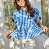 Blue gingham blouse with ribbon bow short sleeves and peplum waist
