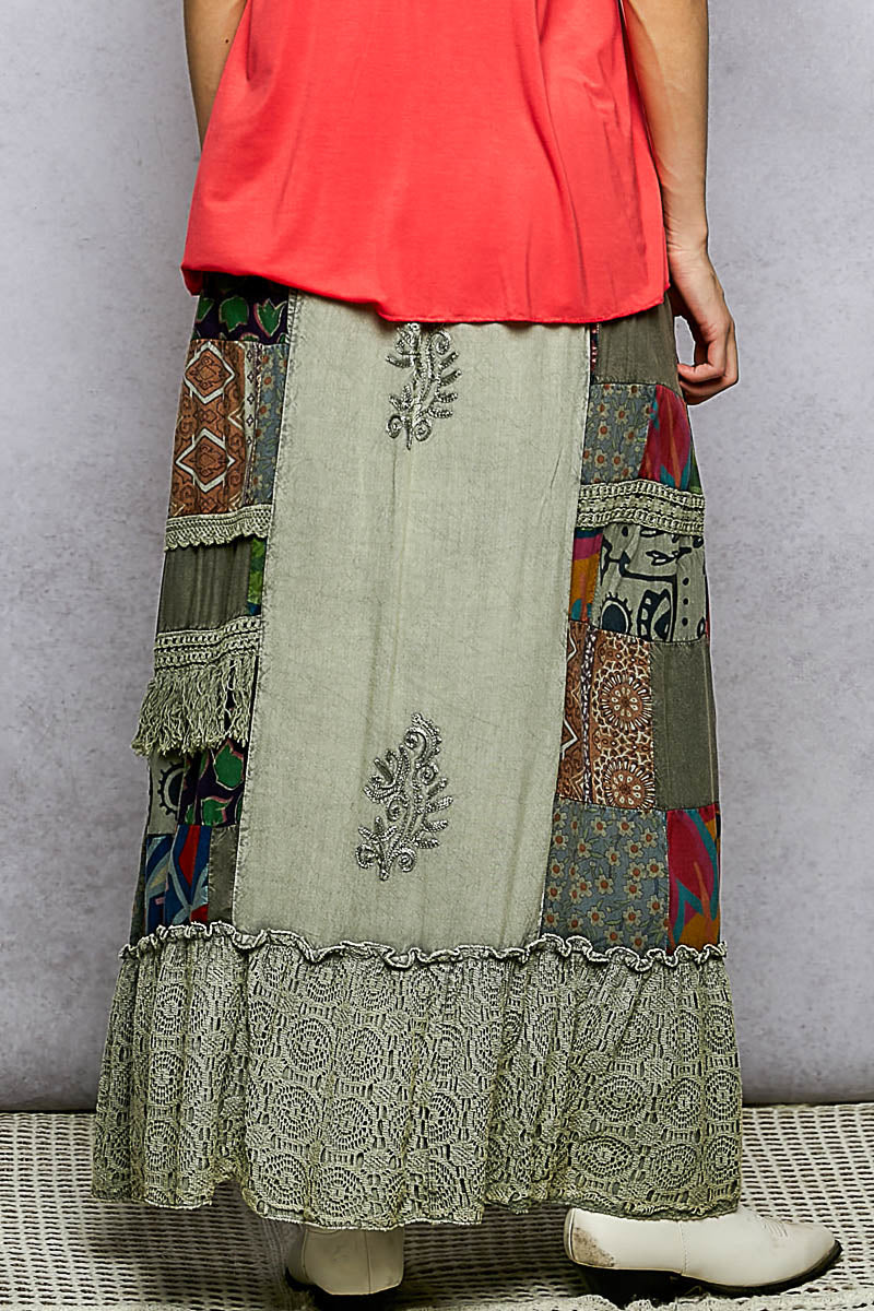 Embroidered sage patchwork ruffled skirt with decorative center motif