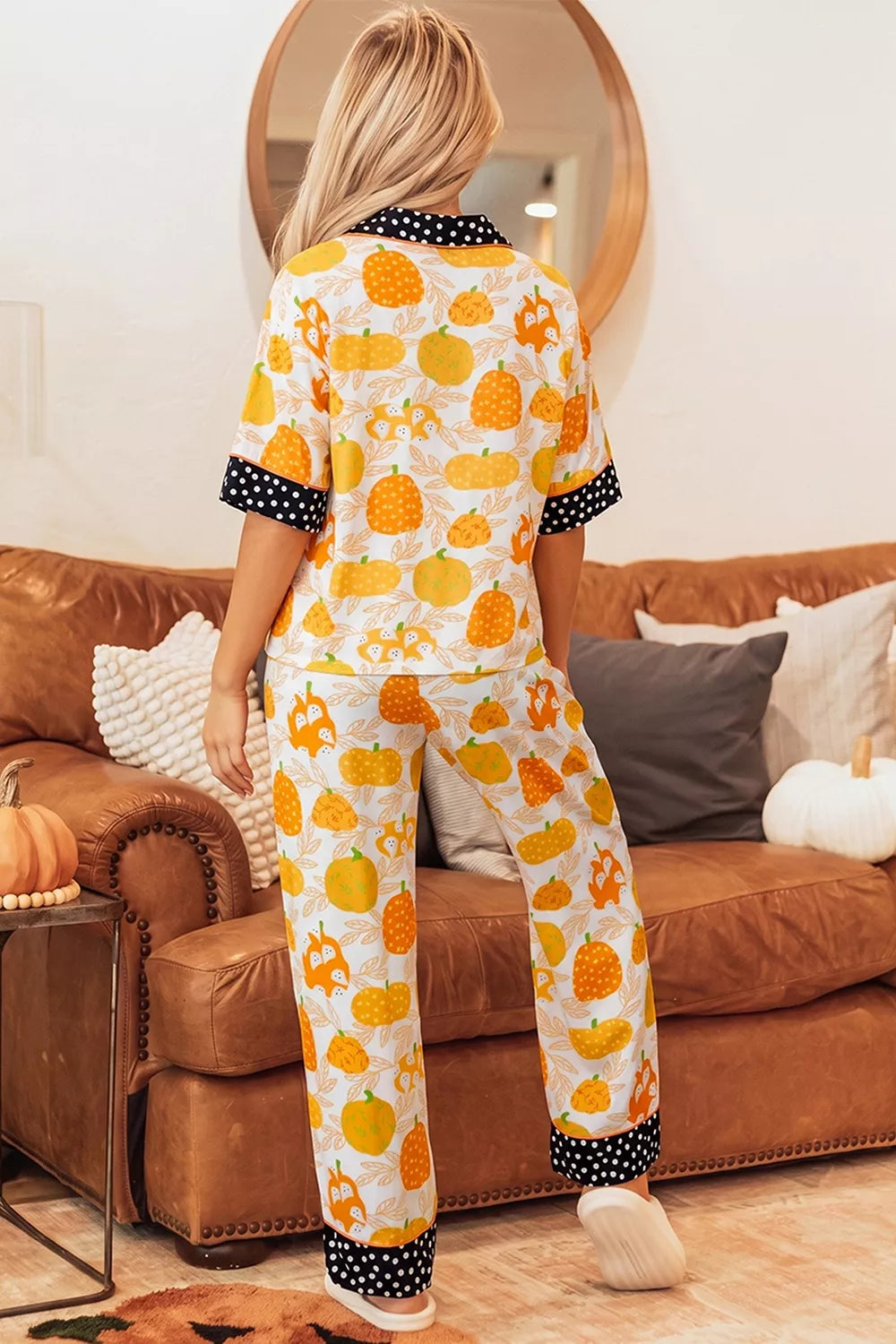 Pumpkin print lounge set with polka-dot cuff trim and button-front top, full-length pants