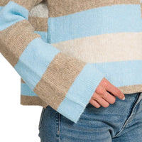 Lightweight sweater sleeve and hem in sky blue, beige, and white color blocks