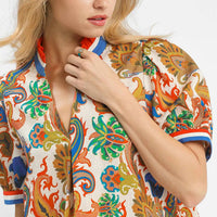 Blue mix abstract print mini dress close-up with collar and short sleeves