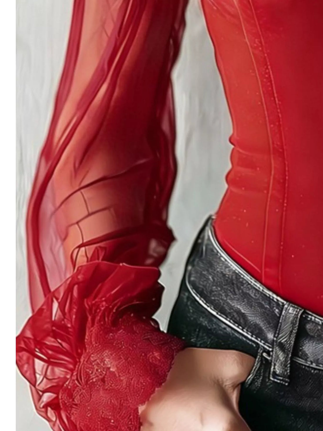 Red velvet blouse with lace cuff detailing on sheer sleeves and fitted bodice