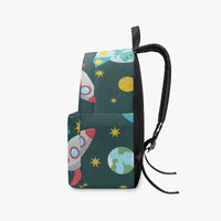 Dark green space-themed canvas backpack with top handle, side drawstring cord, and rocket print.