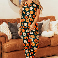 Pumpkin-printed short-sleeve top and lounge pants set in dark green and orange