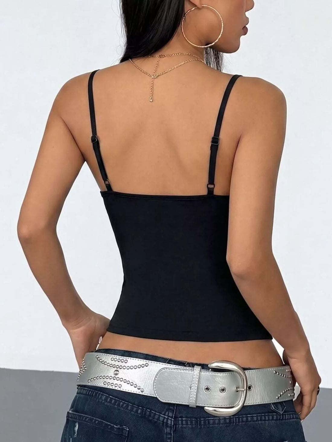 Black slim-fit camisole with open-back and spaghetti straps