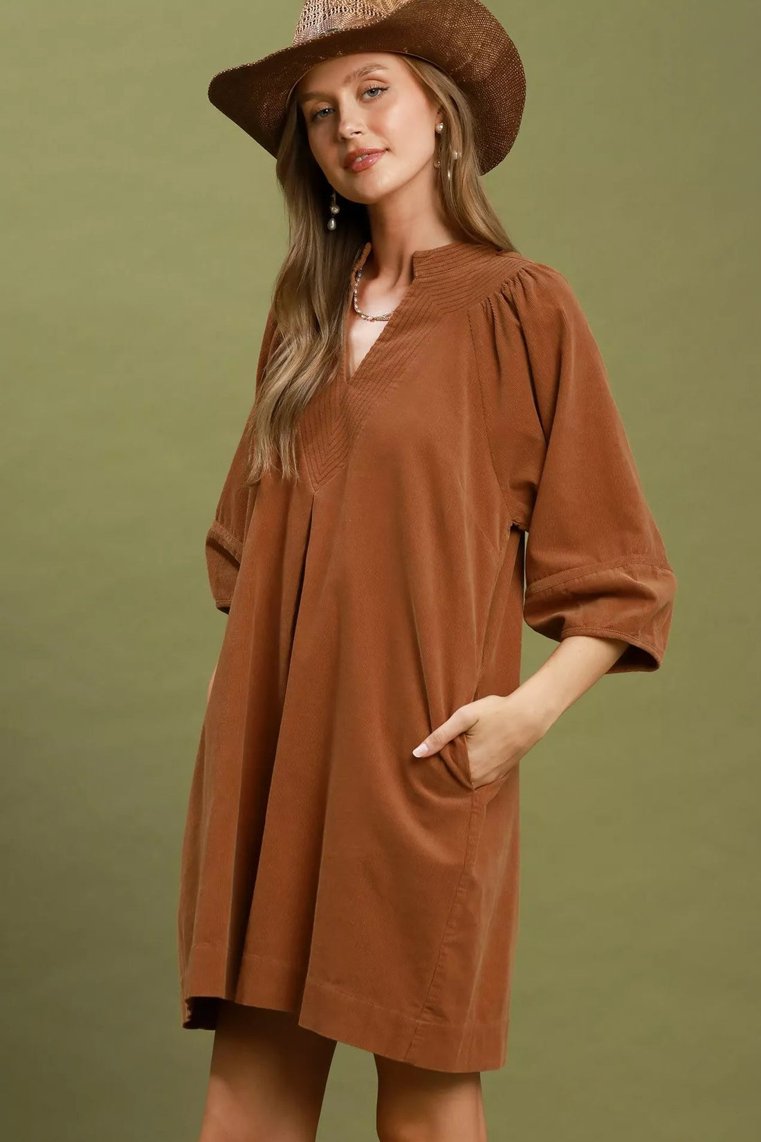 Camel brown corduroy V-neck shift dress with puff sleeves and front pocket
