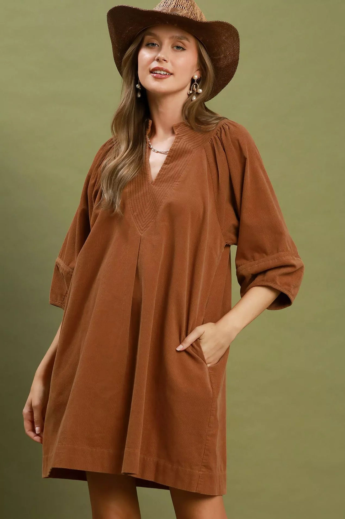Camel brown corduroy V-neck shift dress with puff sleeves and front pockets