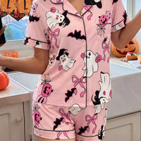 Pink Halloween lounge set with button-down short-sleeve top and matching printed shorts
