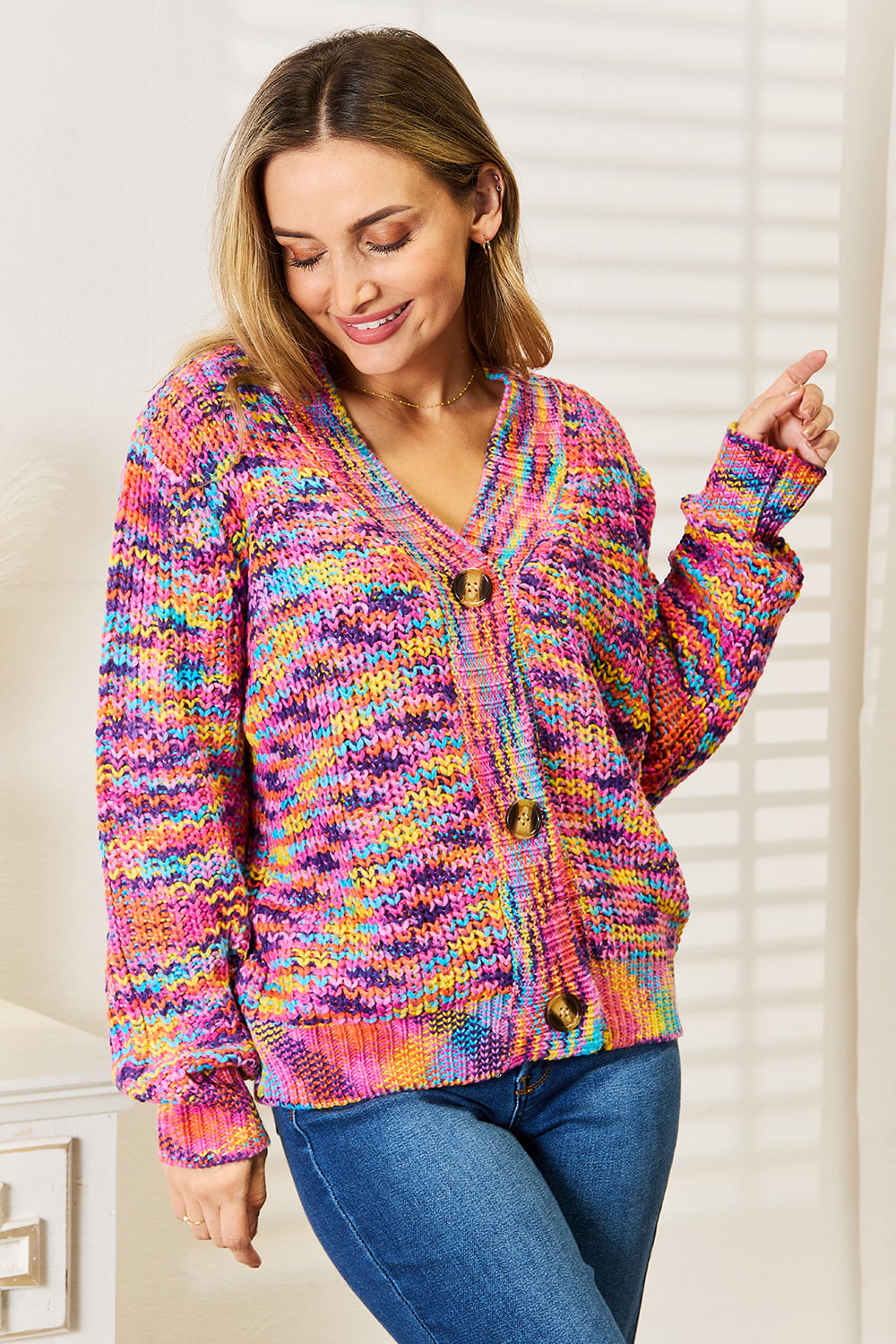 Multicolor v-neck knit cardigan with button-front and long sleeves, marled texture