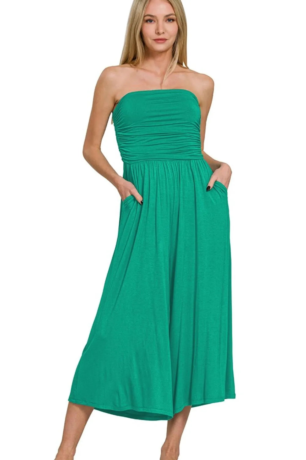 Green strapless tube top jumpsuit with ruched bodice and tiered midi skirt