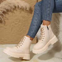 Off-white lace-up platform round-toe boots with side zipper and thick sole