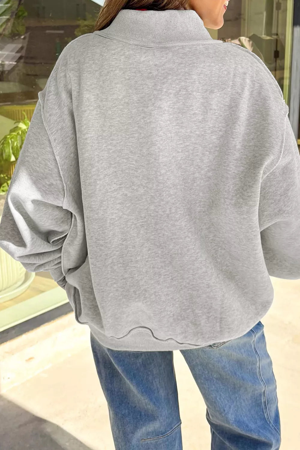 Light gray reversible mock-neck sweatshirt, plain back, dropped shoulders