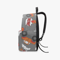 Grey monster truck backpack with orange graphics, side pocket, and black webbed carry handle