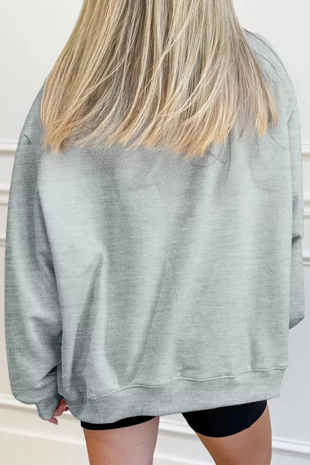 Gray mock-neck pullover sweatshirt from the back view, relaxed fit