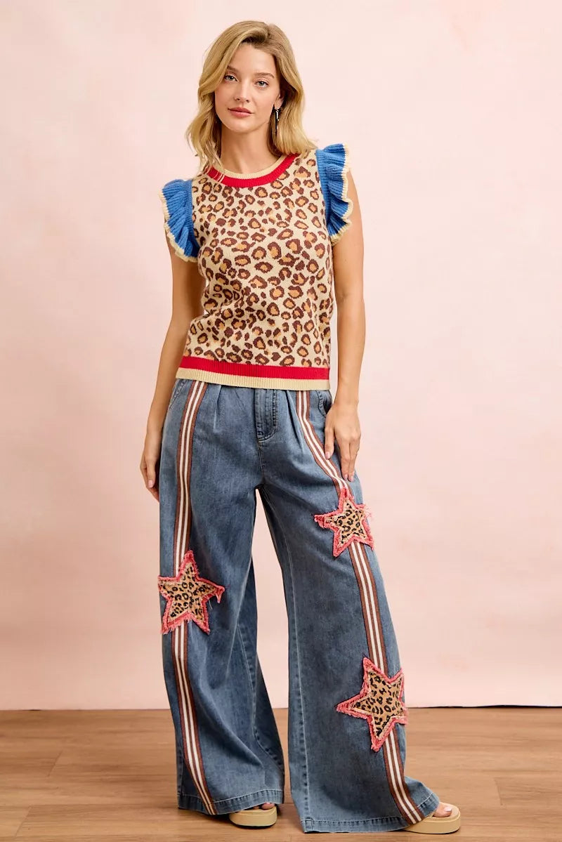 Leopard print knit tank top with blue ruffled sleeves and red neckline trim