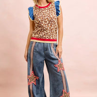 Leopard print knit tank top with blue ruffled sleeves and red neckline trim