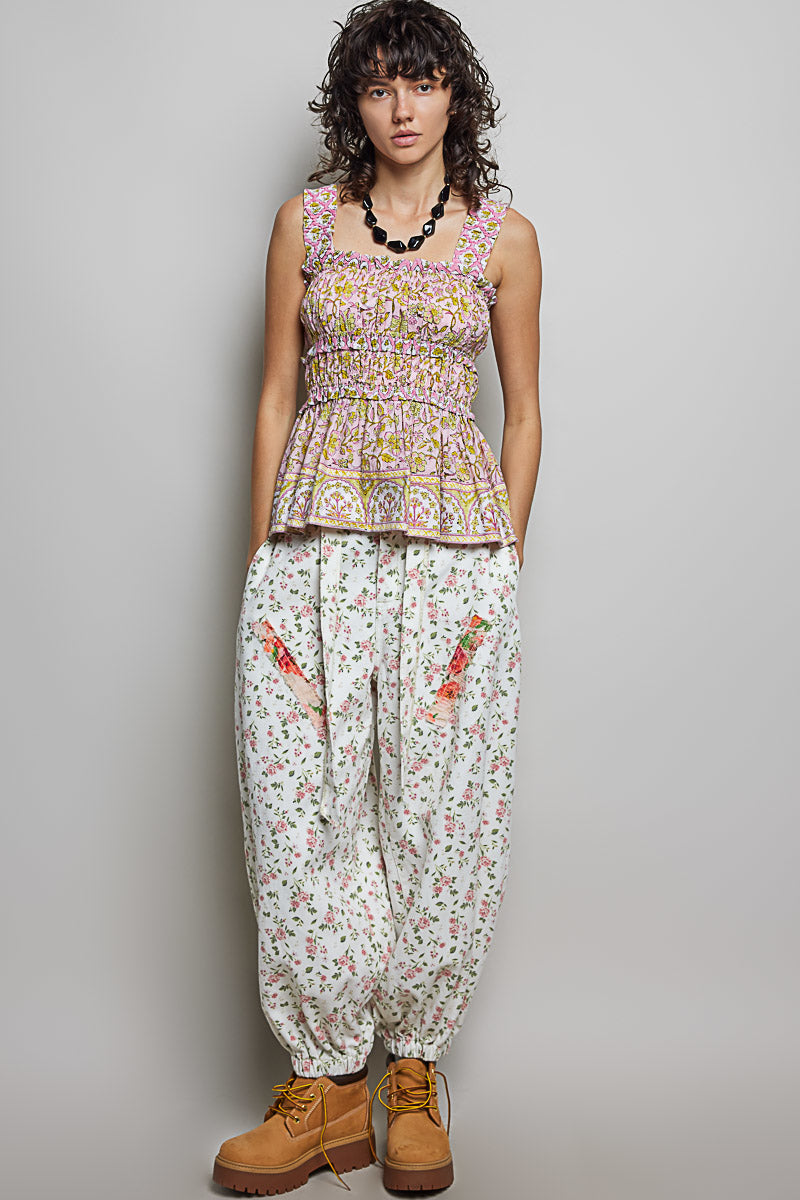 Pink multi printed smocked square-neck peplum tank with gathered waist and ruffle trim