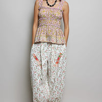 Pink multi printed smocked square-neck peplum tank with gathered waist and ruffle trim