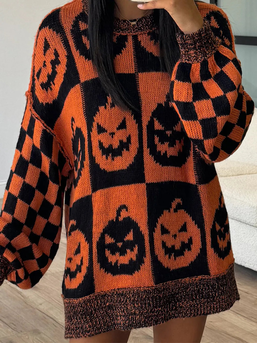 Orange and black pumpkin-pattern knit sweater, round neck, long sleeves, exposed seam