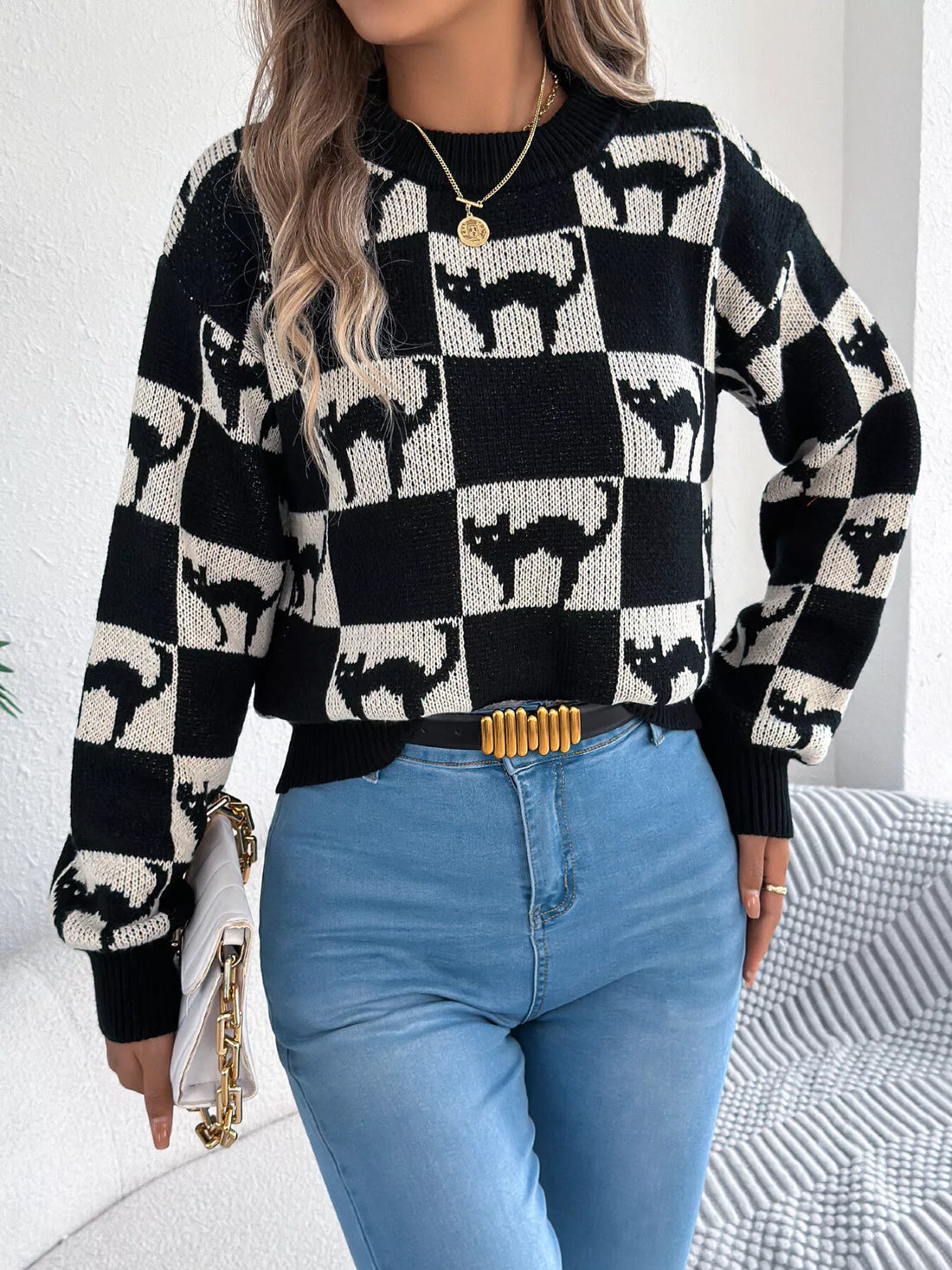 Black checkerboard Halloween graphic sweater, long sleeves, crew neck