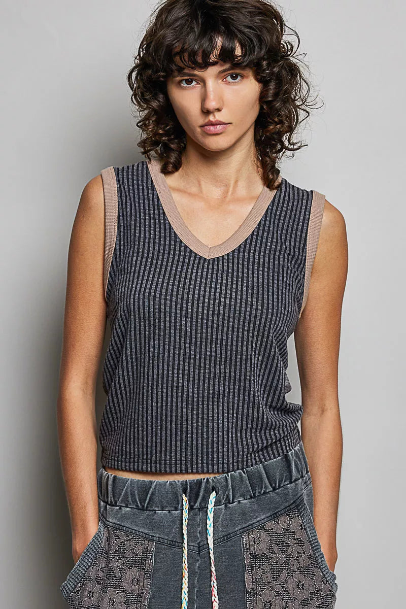 Dark ribbed V-neck sleeveless tank with contrast trim and sleeveless cut