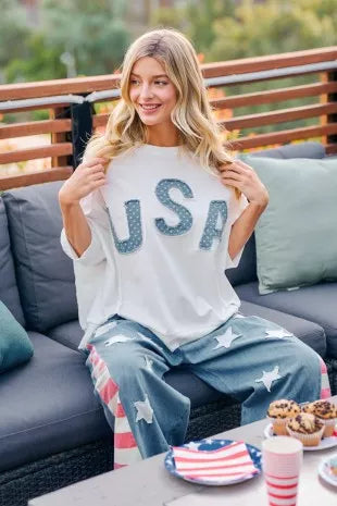 Ivory french terry top with blue "USA" appliqued letters on the chest, relaxed fit