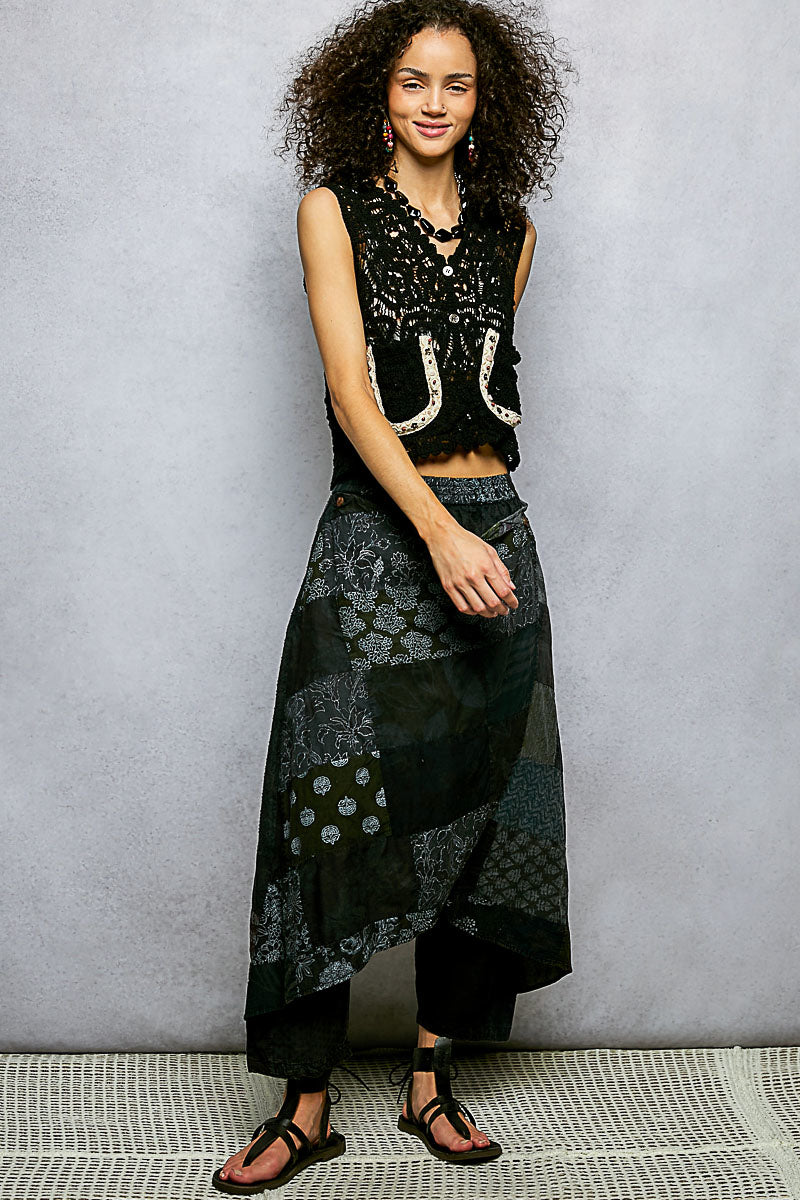 Black crochet cropped vest with horseshoe applique and scalloped edge