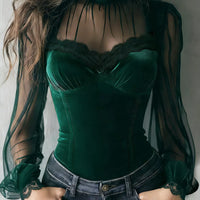 Dark green velvet corset blouse with sheer sleeves and lace-trim bust and cuffs