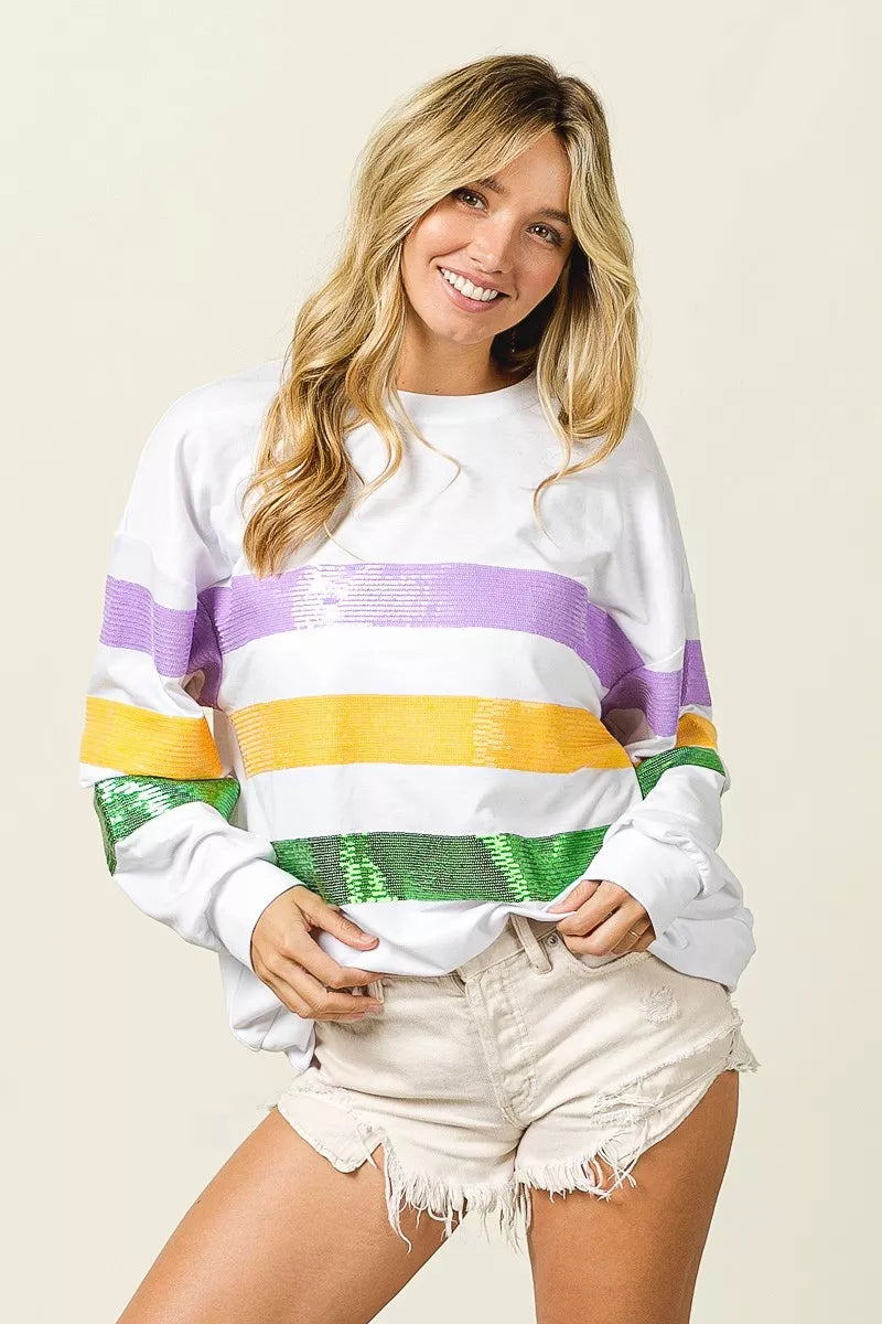Off-white round-neck sweatshirt with sequined horizontal purple, yellow, and green stripes