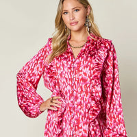 Hot pink printed plus size blouse with ruffle-trim balloon sleeves and button front