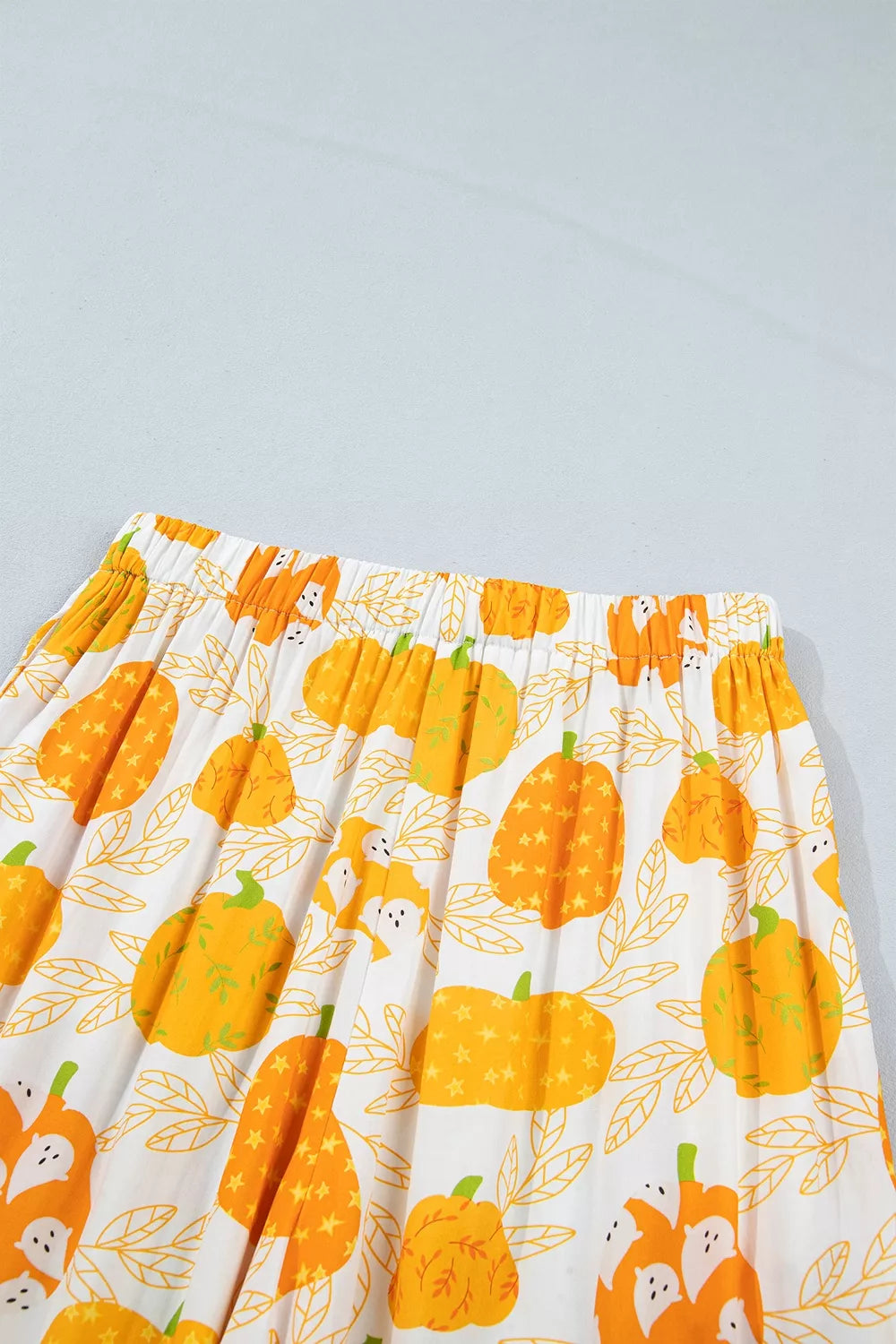 Printed lounge shorts with elastic waist and pumpkin pattern in sherbet tones