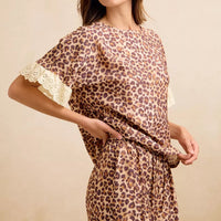 Leopard print top and shorts set with eyelet lace ruffle edges