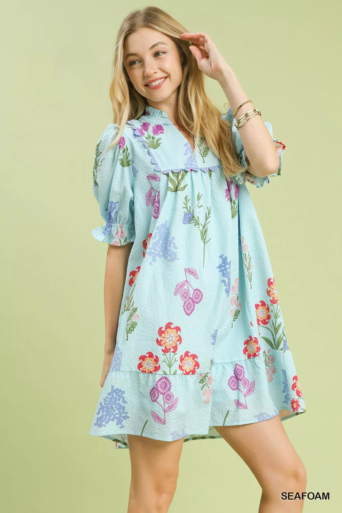 Seafoam blue floral V-neck dress with short puff sleeves and tiered skirt