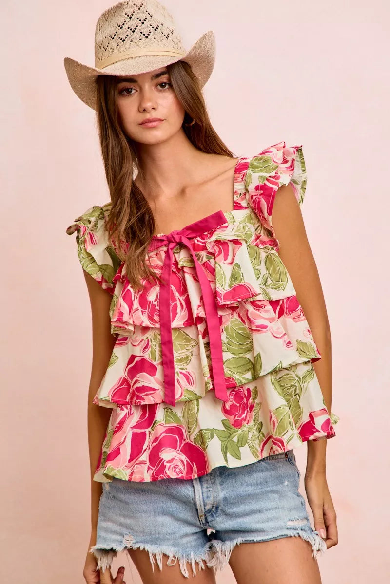 Floral ruffle square-neck top with bow tie at neckline, layered ruffle hem and rose print