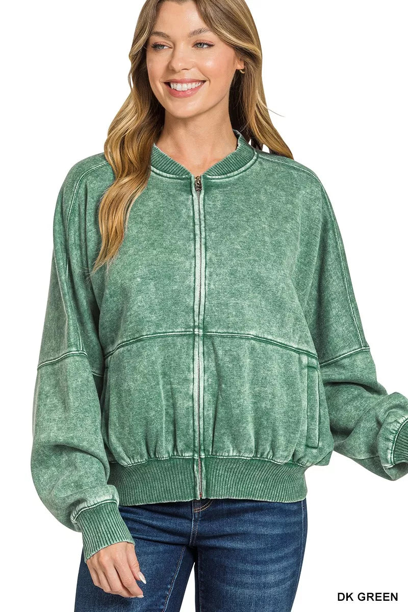 Dark green acid-washed fleece jacket with zip front and ribbed cuffs