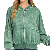 Dark green acid-washed fleece jacket with zip front and ribbed cuffs