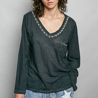 Dark green lightweight knit V-neck long sleeve top with contrast trim