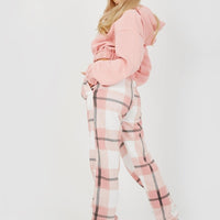 Light pink plaid joggers with side pockets and ankle cuffs.