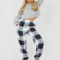 Blue and white plaid joggers with elastic waist and ankle cuffs.