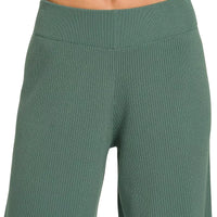 Teal-green wide-leg pants with elastic knit waistband and ribbed texture