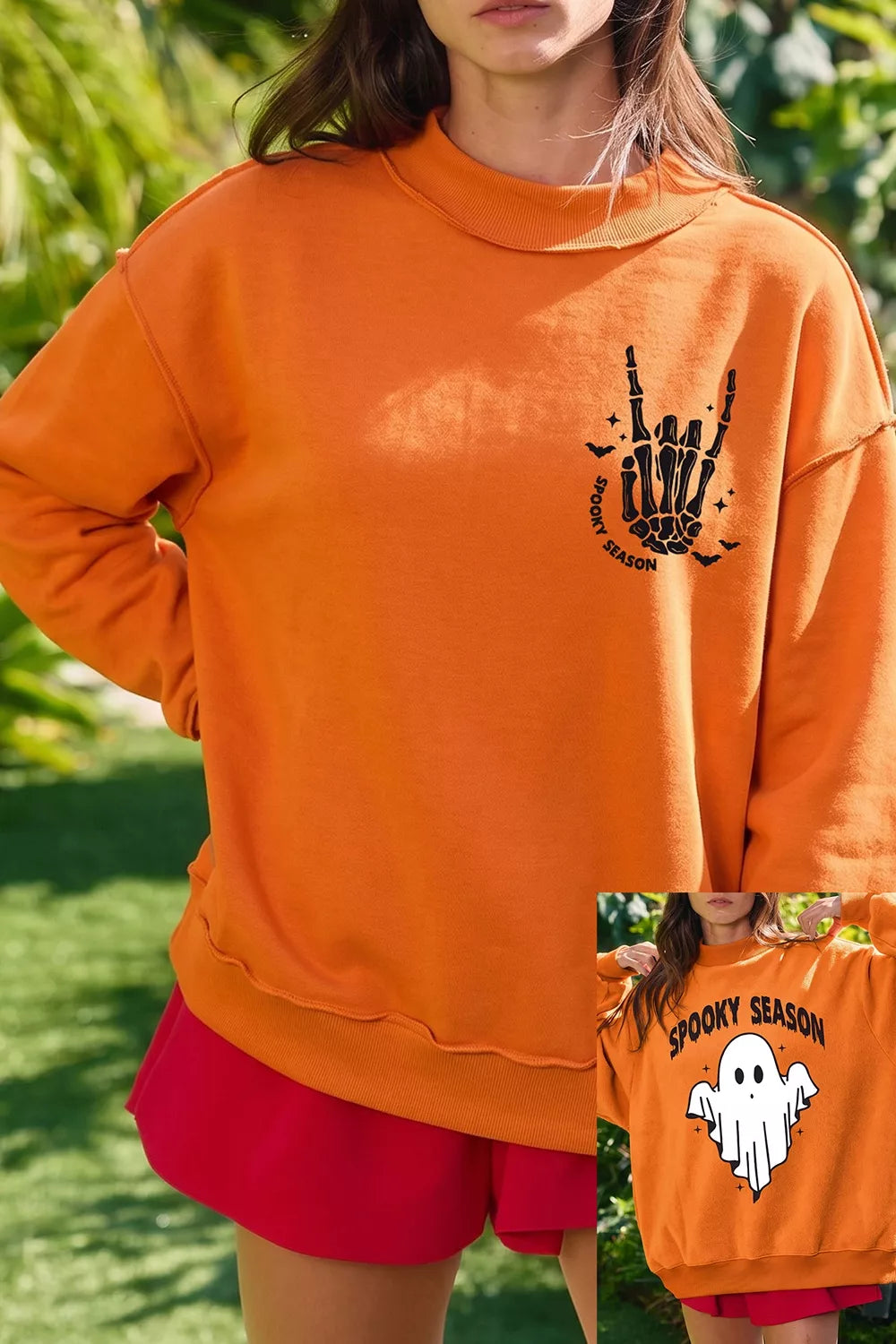 Orange mock neck sweatshirt with skeleton-hand &