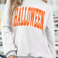 Light gray sweatshirt with bold orange “HALLOWEEN” text at center