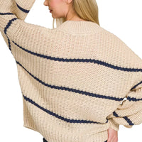 Taupe oversize striped sweater viewed from back, navy horizontal stripes