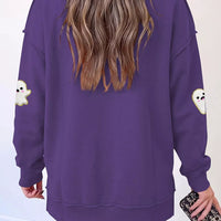 Mauve tunic sweatshirt back with mock neck and ghost graphics on sleeves