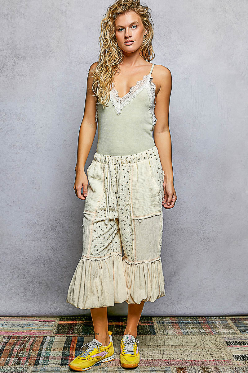 Light sage green ribbed lace-trim cami with v-neck detail and spaghetti straps